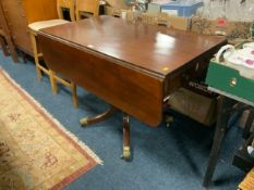 A 19th century mahogany mahogany Pembroke table with unusual fluted column