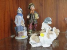 Two Nao figurines together with a Lladro figure and another (4)