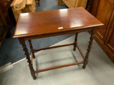 A small oak open twist occasional table
