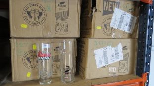 Four boxes of Carling Black Label pint glasses and Coors Light glasses