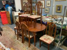 A modern dining table and six chairs