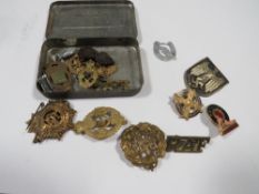 A collection of assorted military and other badges to include a German example, Butlins Skegness