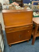 A mid-century teak bureau