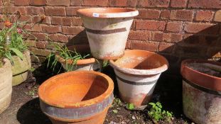 Four large terracotta garden pots (4)