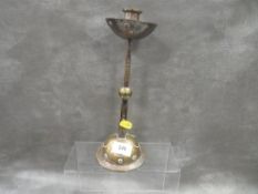 An Arts and Crafts style candlestick
