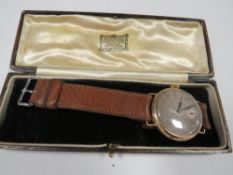 A mens vintage 9ct gold hallmarked wristwatch by Rolex, the dial, case and movement all signed