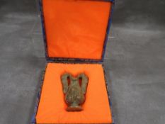 A boxed jade item