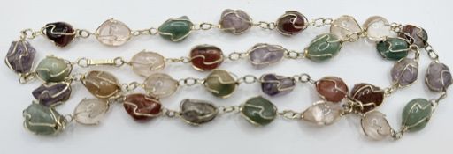 lange Halskette mit div. Halbedelstein-Eiern, Double-Montur, L-ca. 80 cm, 65,5 gr.