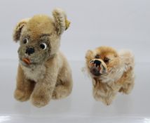2x div. Steiff-Hunde, älter, ca. H-8cm und 12,5cm