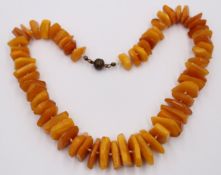 Butterscotch-Bernsteinkette, Steine im Verlauf, ca. 50gr., L-40cm