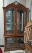Contemporary 4-Door Lighted Display Cabinet.