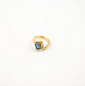 14K Yellow Gold Ring with Green Stone.