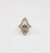 14K White Gold Ring with Blue Stone.