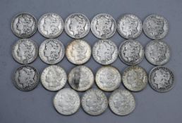 (21) Morgan Silver Dollars.