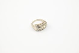 14K White Gold & Channel Set Diamond Ring.