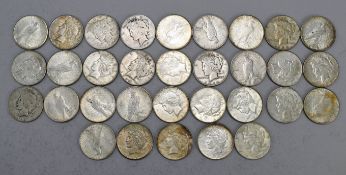 (32) Peace Silver Dollars.