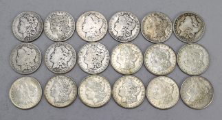 (18) Morgan Silver Dollars.