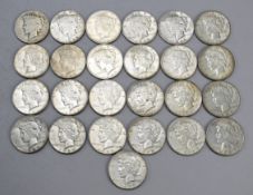 (25) Peace Silver Dollars.