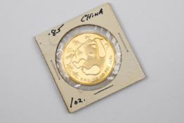 1985 Gold Panda 100 Yuan Coin.