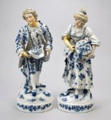 Pair of Continental Blue & White Porcelain Figures.