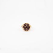 18K Yellow Gold Ring with Garnet Style Stones.