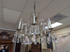 8-Light Drop Crystal Chandelier With Wrought Metal Frame.