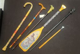 (4) Walking Sticks & an Oar.