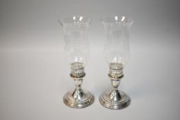 Pair of Weighted Sterling Candle Holders.