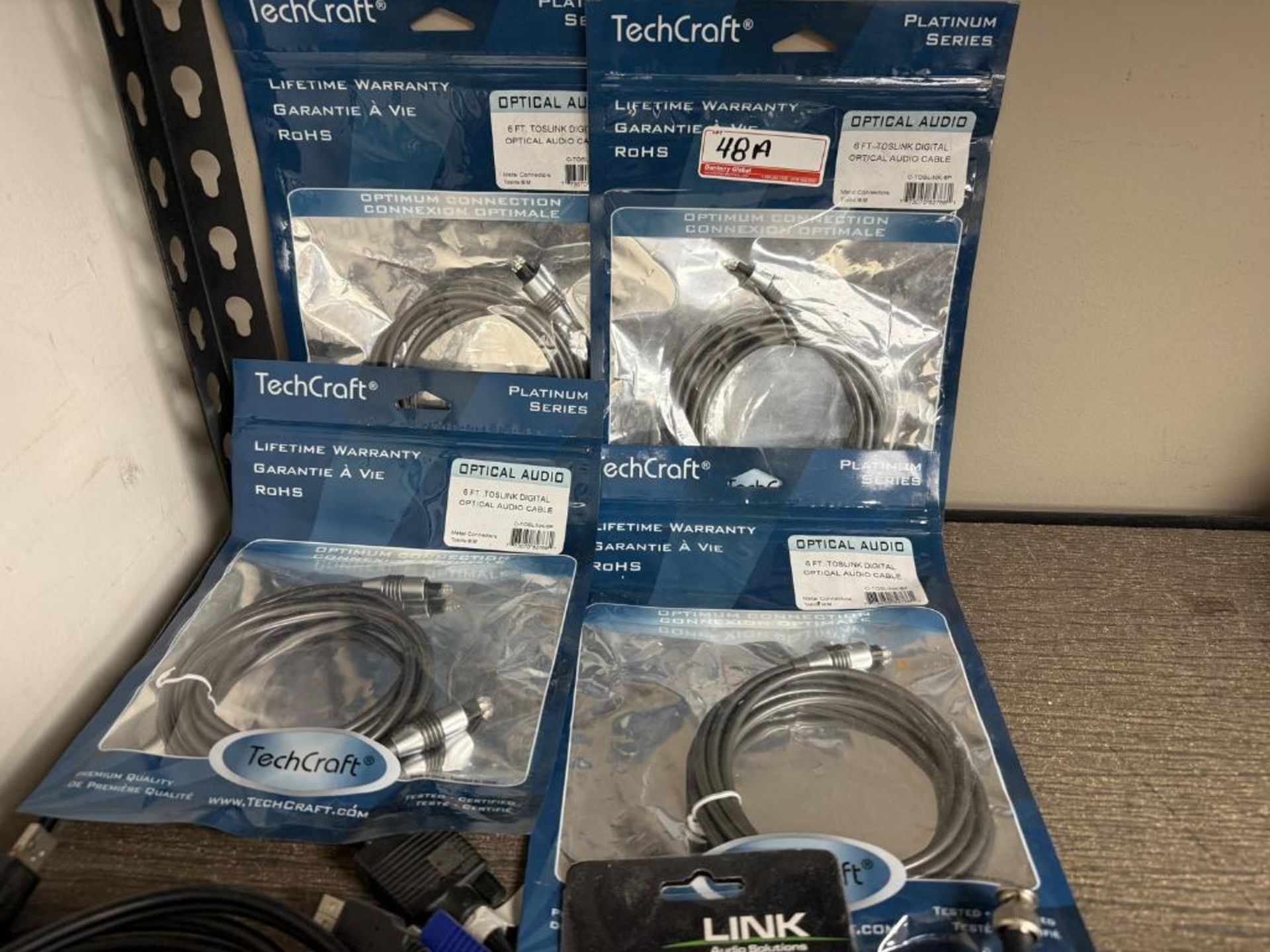 LOT - 2-WAY RADIOS, ANTENNA BOOSTERS, OPTICAL & ASSTD CABLES