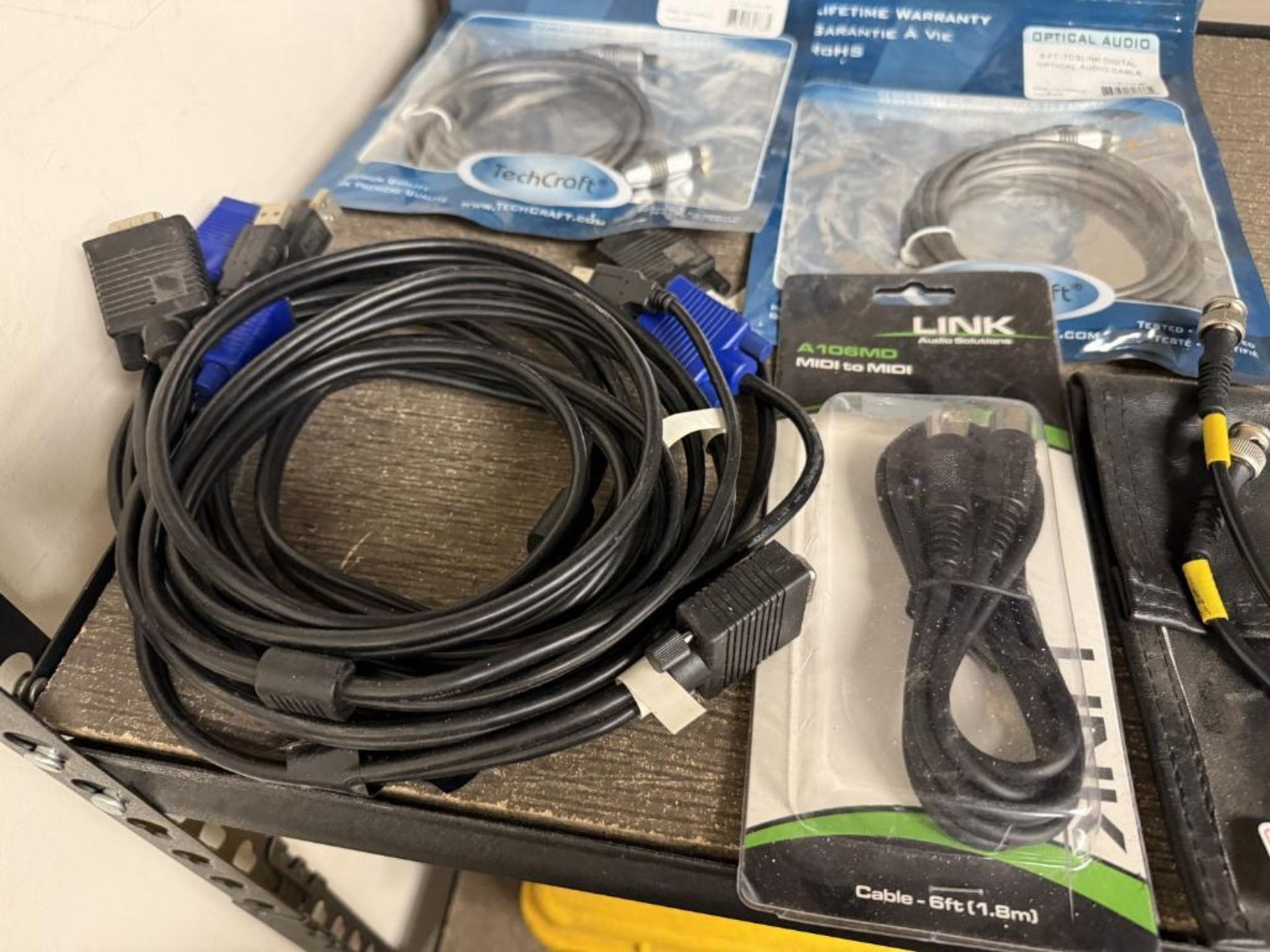 LOT - 2-WAY RADIOS, ANTENNA BOOSTERS, OPTICAL & ASSTD CABLES