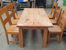 Rustic wooden farmhouse dining table
