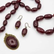 A cherry amber-style jewellery set.