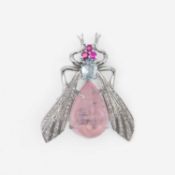 An unusual silver fly brooch set with diamonds, aquamarine, pink beryl and rubies.