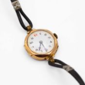 A 9k cased lady's manual wind wristwatch.