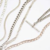 A selection of silver and white metal chains.