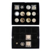A collection of coins in two Westminster boxes, including a 2010 Cook Islands 5 dollar gold coin.