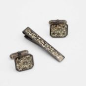 A 'sterling 950' silver niello tie clip and pair of cuff links set.