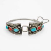A native American Navajo silver turquoise and coral set bracelet, probably by Jerome Begay.