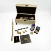 A box of costume jewellery.