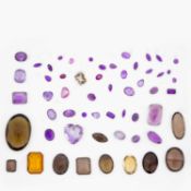 A collection of loose quartz gemstones.