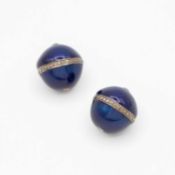 A pair of dark blue enamel ovoid beads each set with a band of small diamonds.