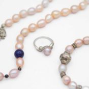 A selection of pink freshwater pearl jewellery.
