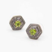 A pair of silver-gilt hexagonal peridot and diamond set stud earrings.