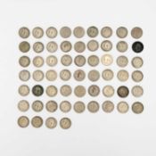 GB - A collection of George V & VI post 1920 .500 silver one shilling coins.