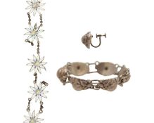 GEORG JENSEN - a bracelet with one matching earring, and a silver and enamel part bracelet.