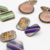 Three pairs of silver cuff-links.