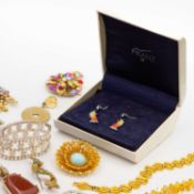 A selection of named costume jewellery items.