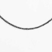 UNOAERRE - A dainty hematite faceted bead necklace, strung to an 18k spring clasp.