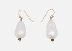 A pair of large baroque pearl, diamond-set drop earrings with gold hooks.