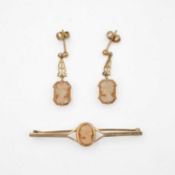 A 9k shell cameo bar brooch and pair of cameo drop earrings.